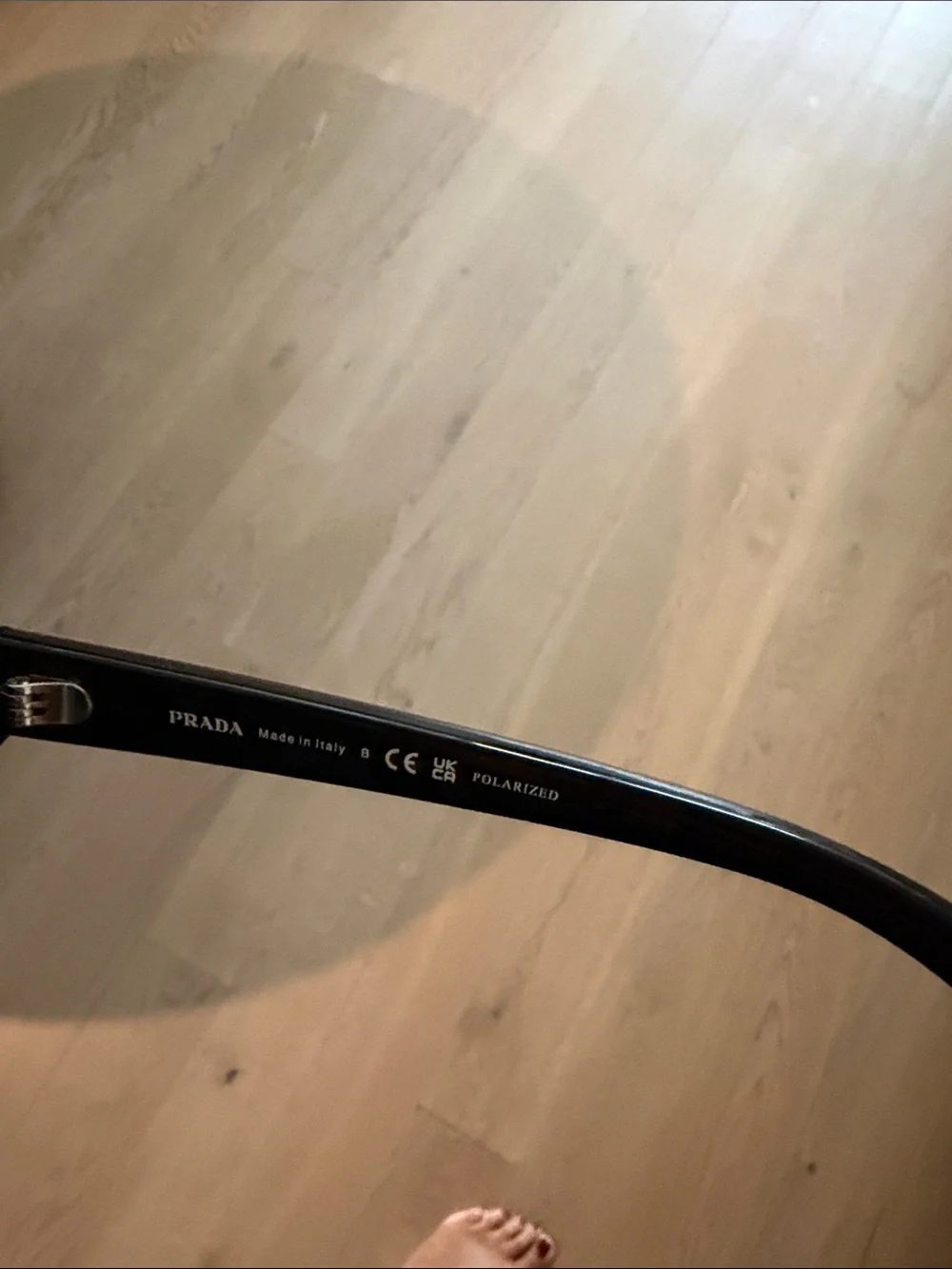 Prada Black Women's Rounded Cat-Eye Sunglasses